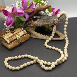 Hand carved bone necklace with floral cloisonné clasp C2
